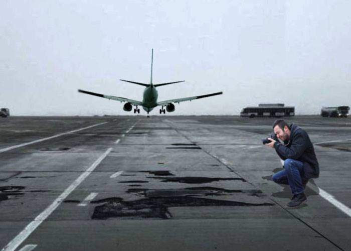 Primăria Bucureşti va plăti 3 milioane de euro unui fotograf, ca să pozeze gropile de pe pista Aeroportului Otopeni