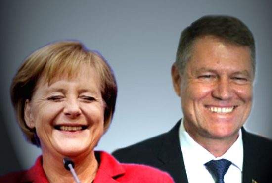 Zeci de fotografi berlinezi, cu obiectivul crăpat după ce Iohannis şi Merkel au zâmbit simultan