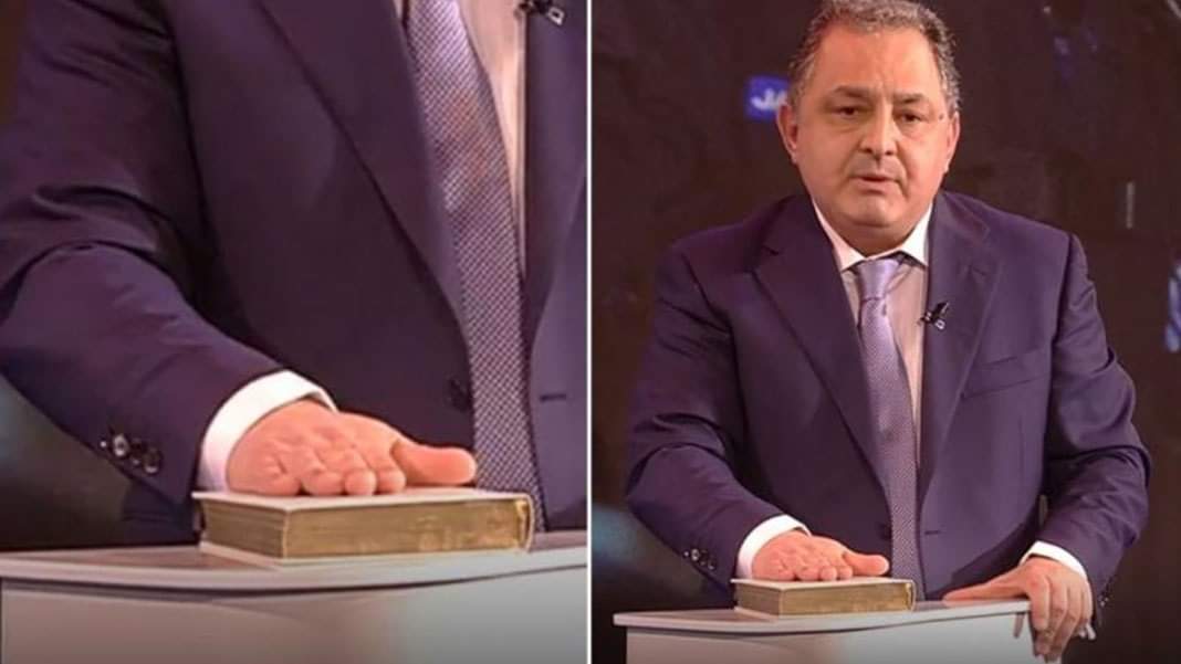 Vanghelie, prins încercând să fure o Biblie în direct la televizor