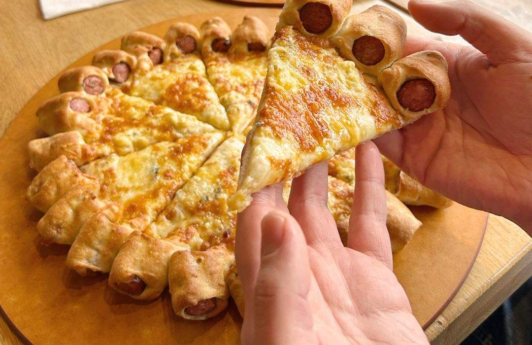 Pizza Hut, favorit la Salonul de Invenții de la Geneva după ce a pus cârnați în blat