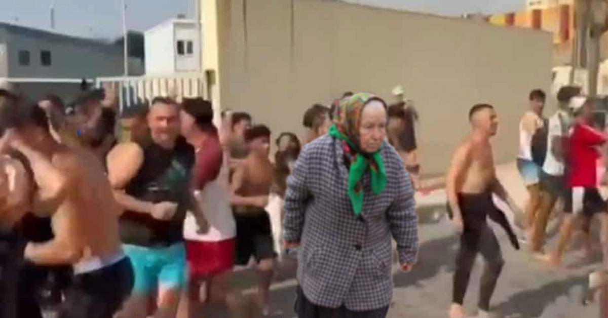 Sute de pensionari din România găsiți la coada de migranți din Ceuta, erau curioși ce se dă